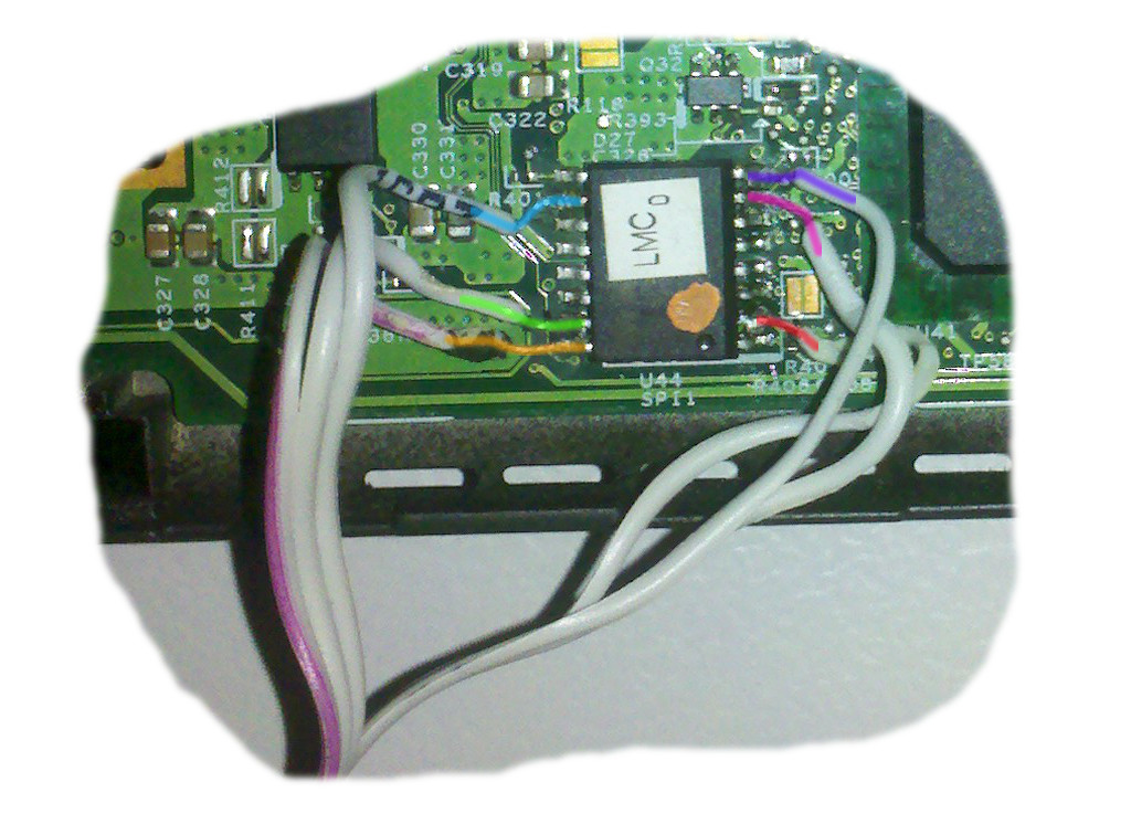 Wires soldered to MX25L6405D, coloured